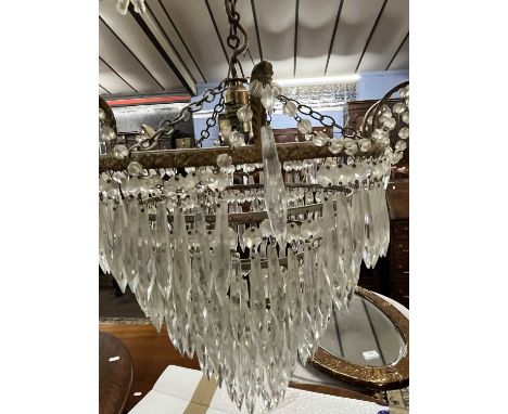 A early 20th Century circular hanging ceiling light fitting with glass prismatic drapes, 31cm diameter