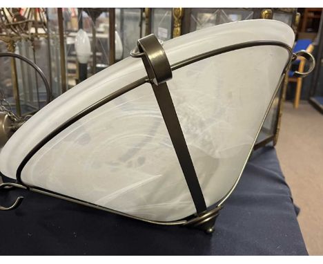 A pair of contemporary ceiling light fittings with frosted glass shades and bronzed metal frames, 40cm diameter