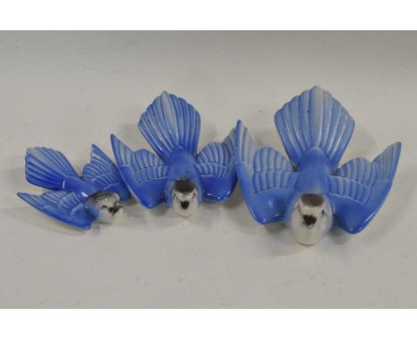 A group of Poole Pottery swallows with blue painted decorationLot 427 in good condition - no damage