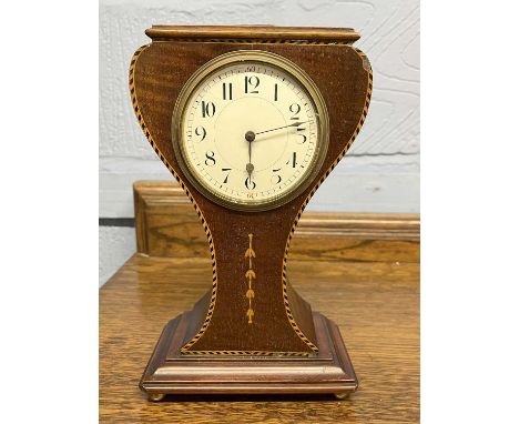 An Edwardian mahogany cased mantel clock, 25cm high