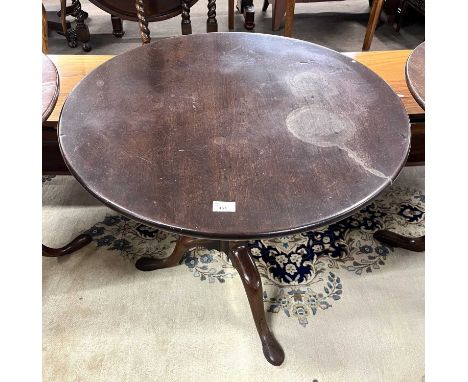 George III mahogany bird case pedestal table with circular mahogany top raised on a turned column and tripod base, top 78cm d