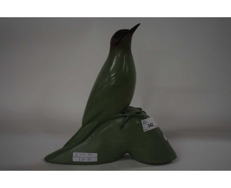 A stone ware model of a bird marked Oswaldo Merchor, number 2 of 12