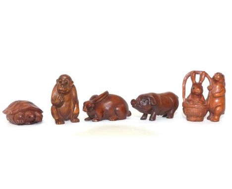 5 Netsuke carved animal figures, modelled as a monkey, a tortoise, rabbits, a hare and a pig