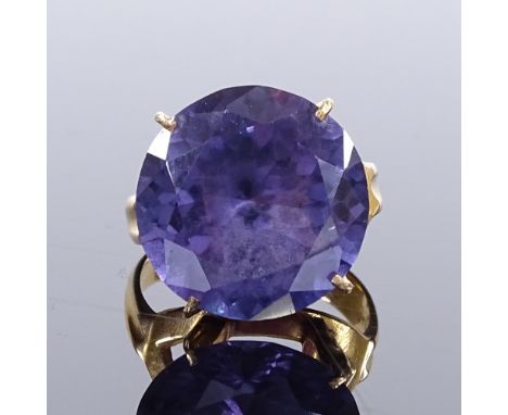 A Middle Eastern 14ct gold synthetic sapphire dress ring, sapphire diameter 16.3mm, size N, 6.6gVery good original condition,