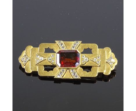 An Art Deco unmarked gold red stone and rose-cut diamond stepped brooch, pierced flared settings, stamped Rosas, brooch lengt