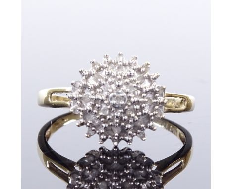 A 9ct gold diamond cluster dress ring, total diamond content approx 0.15ct, setting height 11.9mm, size R, 2.3gGood original 