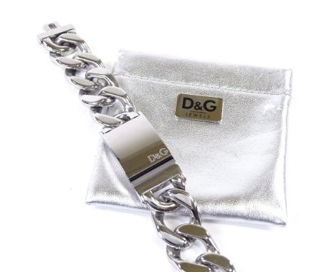 A large Dolce & Gabbana stainless steel D&G logo bracelet, thick flat curb links with central curved panel, bracelet length 2