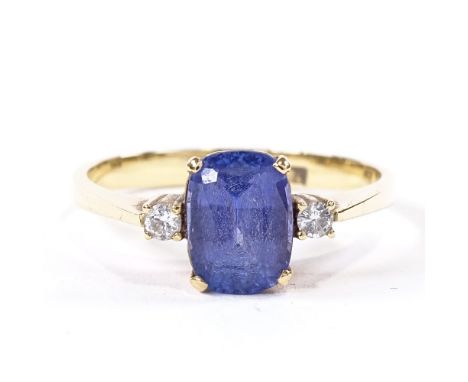 An 18ct gold 3-stone tanzanite and diamond dress ring, set with oval mixed-cut tanzanite and round brilliant-cut diamonds, ta