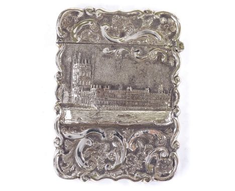 A Victorian silver castle-top rectangular visiting card case, the Houses of Parliament, by Hilliard & Thomason, hallmarks Bir