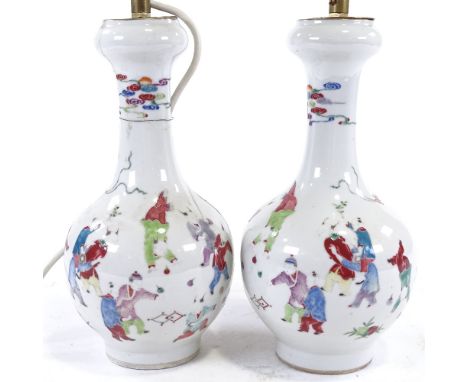 A pair of Chinese porcelain vases, with enamel decoration of kite flyers, 4 character marks under base, height 25cm.Lamp conv