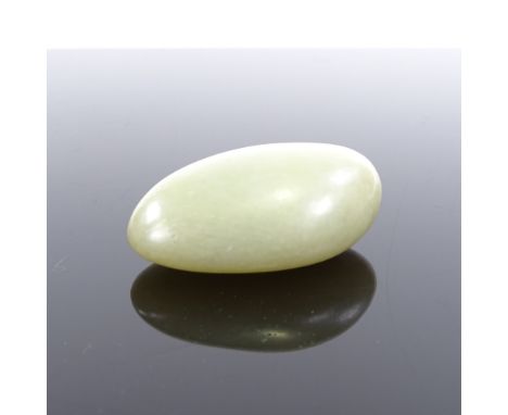 A Chinese jade touchstone, length 5cm 