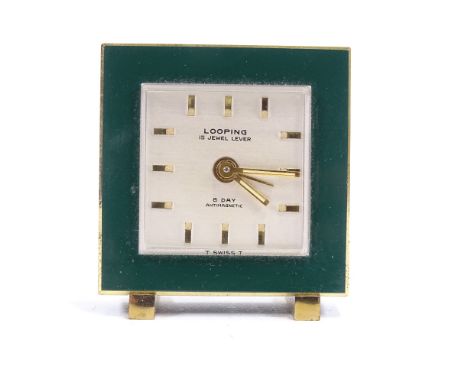 LOOPING - a Swiss Art Deco 8-Day brass and green enamel travelling alarm clock, silvered dial with gilt baton hour markers, 1