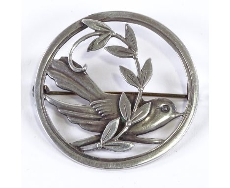 CHRISTIAN VEILSKOV - an Art Nouveau Danish silver modernist circular bird brooch, pierced and engraved settings, maker's mark
