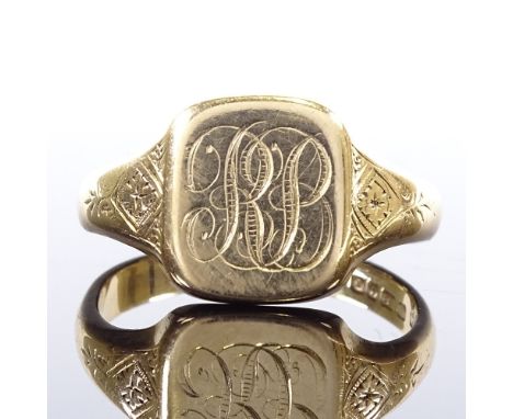 A large 18ct gold signet ring, floral engraved shoulders with monogram panel, maker's marks AC Co, panel height 13.8mm, size 