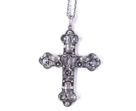 A large Art Nouveau Danish silver cross pendant necklace, pierced floral and horseshoe settings with flat-link chain, maker's