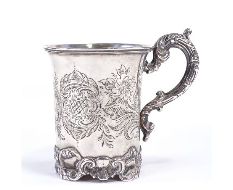 A Victorian silver christening mug, fluted cylindrical form with cast acanthus leaf handle, foliate base and floral engraved 