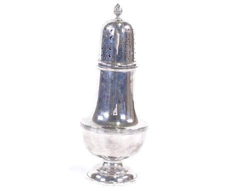 A George V silver sugar caster, baluster form with reeded waist and flame finial, by William Hutton & Sons Ltd, hallmarks Bir