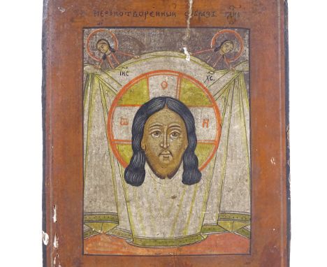 An 18th/19th century Eastern European icon, on wood panel, height 31.5cm.Some damage to plaster on front of panel also small 