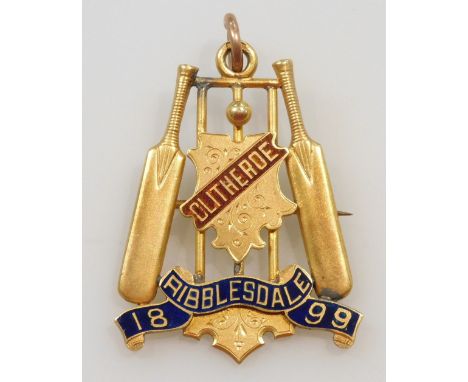 A 9ct gold and enamel cricketing medallion, with loop suspension, formed as the stumps, cricket ball and a pair of cricket ba