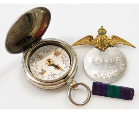 A World War One military compass 1918, stamped Terrasse.W.Co VI, 69310, a dog tag named to Davies, 23554014, RAF wings brooch