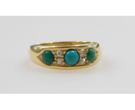 A late Victorian 18ct gold dress ring, set with three turquoise stones and old cut diamond chips, London 1900, size O, 4.8g a