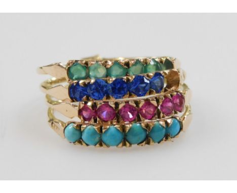 A four band interlinked ring, set with turquoises and three colours of gem stones, set in yellow metal, indistinctly marked, 