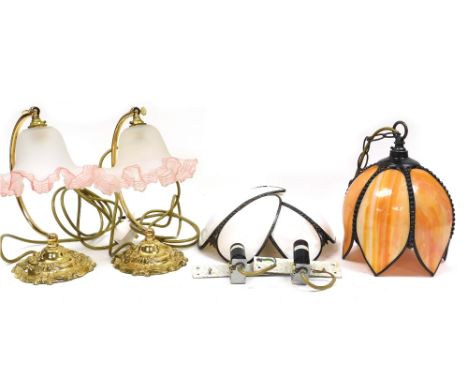 A group of lighting, comprising an orange opalescent tulip form ceiling light, and a pair of white opalescent demi lune wall 