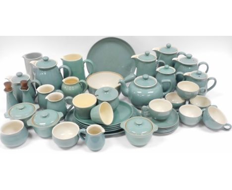 A Denby Manor Green pottery part dinner and tea service, including a teapot, cupboard jugs, saucepan, oval meat platter, tea 