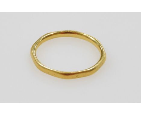 A 22ct gold wedding band, of octagonal form, size M/N, 2.2g. 