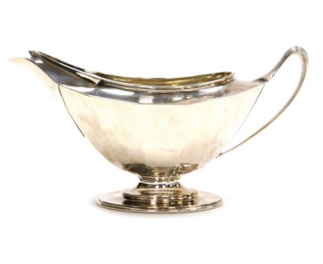 A George V silver boat shaped cream jug, Harrison Brothers &amp; Howson (George Howson), Sheffield 1921, 6oz, 8.5cm high.