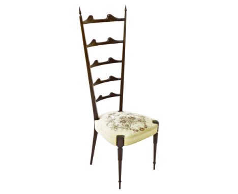 A mid century ladder back dining chair, possibly Chiavari, with a floral embroidered seat, raised on turned tapering front le