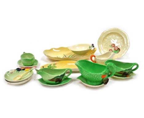 A group of Carltonware, leaf moulded tablewares, with floral decoration, including dishes, plates and sauce jugs.  (a quantit