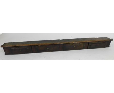 A Georgian oak dresser section or spice rack, of four drawers, 156cm wide.