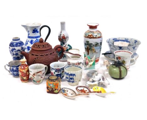 A group of Asian and European ceramics, including a Chinese red ware teapot, Kakiemon porcelain vase, blue and white baluster