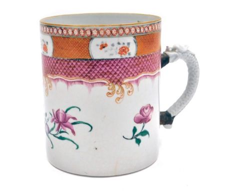 An early 19thC Chinese export famille rose porcelain mug, of large proportion, the upper band decorated with reserves of flow