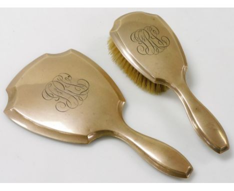 A sterling silver backed hand mirror, and hair brush, monogram engraved.