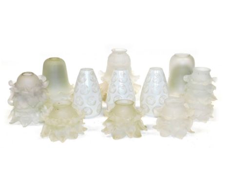 A group of frosted glass light shades, varying designs of trumpet form, petal form, etc. (1 tray)