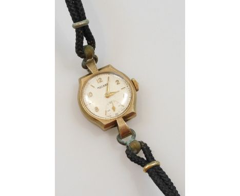 A Rotary lady's 9ct gold cased wristwatch, the circular silvered dial with engine turned decoration, subsidiary seconds dial,