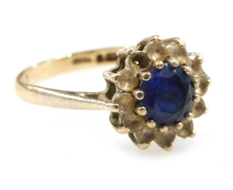 A 9ct gold sapphire and white sapphire set flower head ring, one stone lacking, size O/P, 2.7g. 