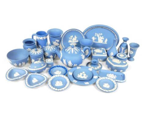 A group of Wedgwood light blue jasperware, including a teapot, bud vases, sucrier, jugs, pots and covers and plates. (a quant