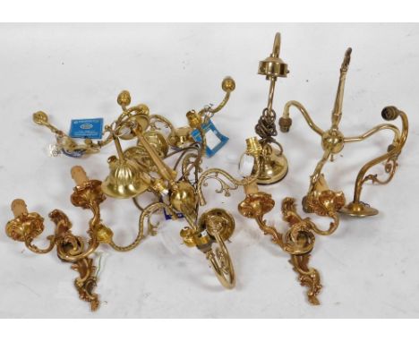 A pair of rococo style brass twin branch wall lights, two brass chandeliers, and a brass desk lamp, etc. (a quantity)