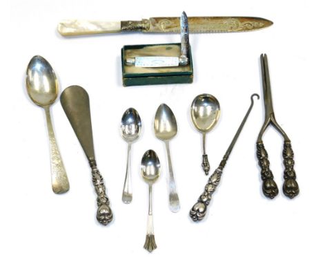 A group of small silver, to include a silver handled shoe horn, button hook and glove stretchers, silver teaspoons, a mother 