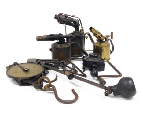 Three vintage blow torches, an amp meter, Salter's spring balance scales, and a spit jack. 