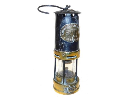A Thomas and Williams Limited Cambrian type number 1 miner's lamp, in brass and cast iron, 25cm high. 