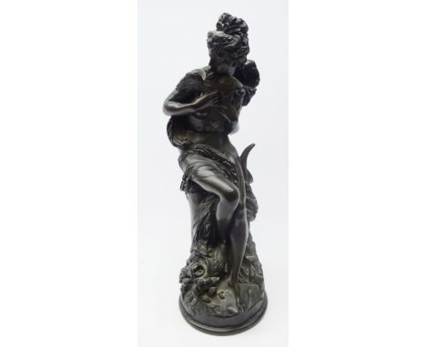 Victorian style bronzed resin model of a lady holding doves after A. Carrier Belleuse, H59cm  Condition Report Click here for