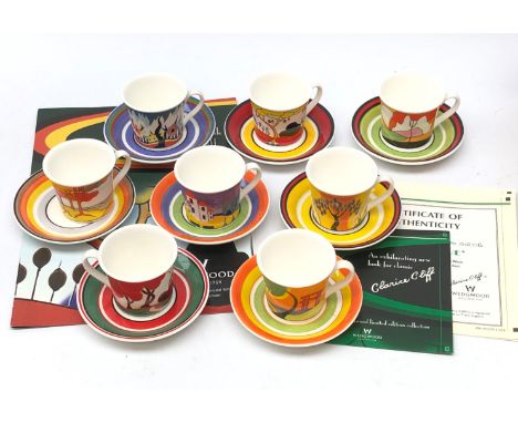 Set of eight Wedgwood Clarice Cliff Cafe Noir coffee cups and saucers comprising Blue Lucerne, Coral Firs, Fantasque Mountain