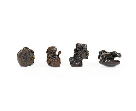 A Japanese Hardwood Netsuke, Meiji period, as a crab on a seed pod, signed to bone tablet, 4.5cm high; A Similar Netsuke, as 