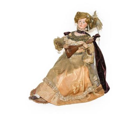 A Late 19th/Early 20th Century French Musical Automaton,  as a lady with composition head, painted features, her blonde mohai