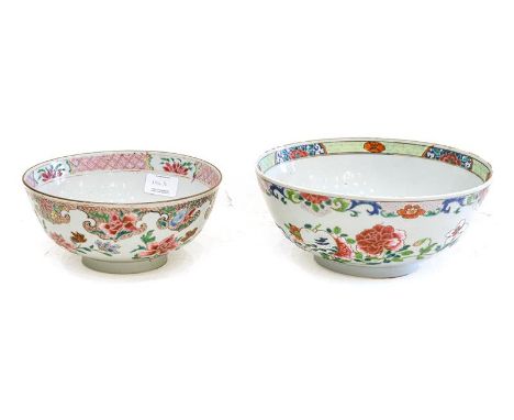 A Chinese Porcelain Bowl, Qianlong, painted in famille rose enamels with flowersprays and objects within foliate borders, 23.