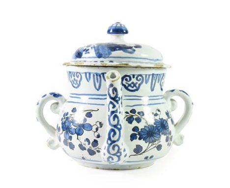 An English Delft Posset Pot and Cover, probably London or Brislington, circa 1690, of baluster form with twin scroll handles 